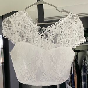 Small Lulus white lace zip up (back) crop top. Never worn.